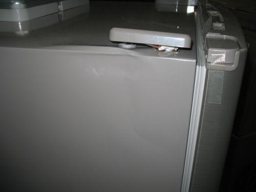 Холодильник с дефектом